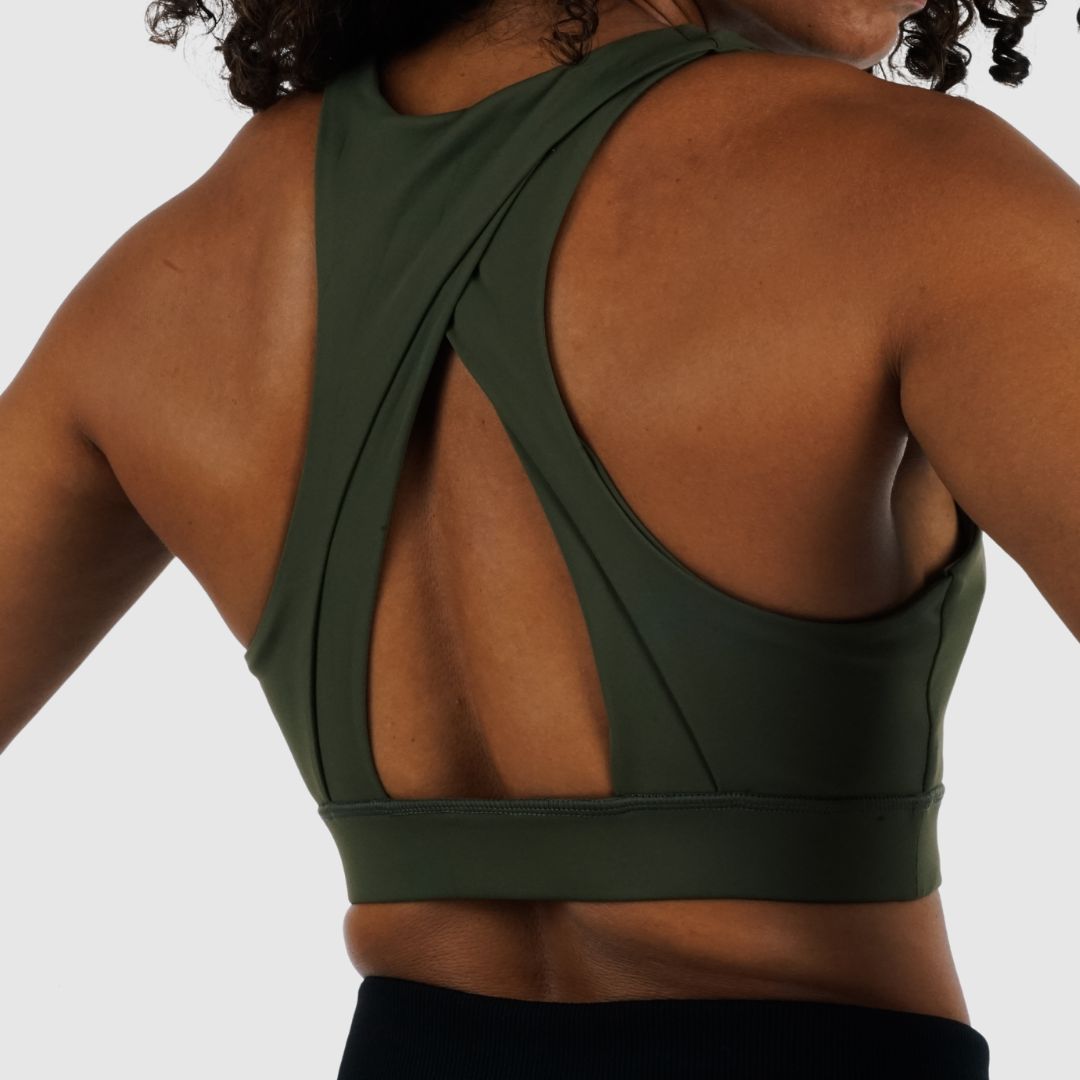 Back view of Olive Green Racerback Sports Bra on model. Highlights wide cross-strap design for maximum support and mobility