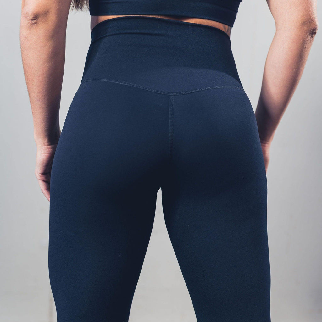 Back view of UNANIMOUS Sport Leggings Black highlighting form‑fitting cut and premium fabric