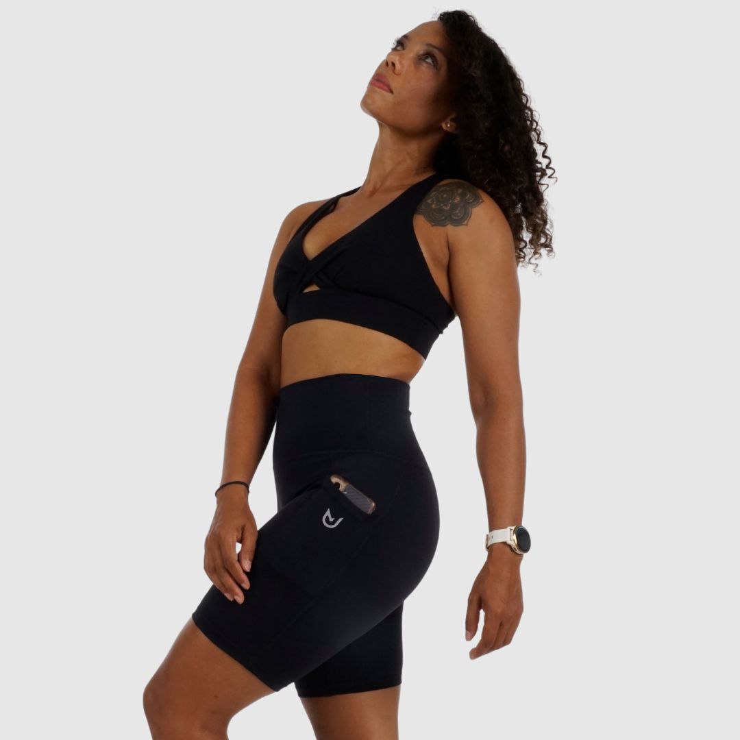 Side profile of Black Cycling Shorts highlighting 8.5 cm wide side pocket and premium fabric