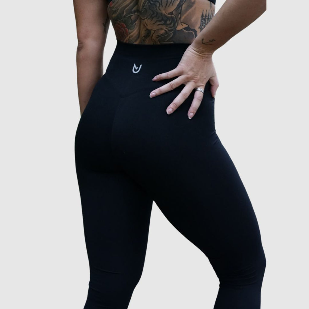 Black Movement No Front Seam Leggings – Full-length front view on model
