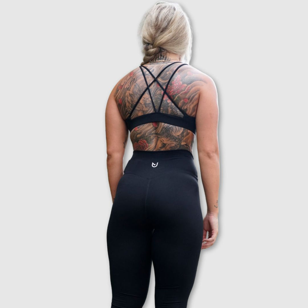 Black Movement No Front Seam Leggings – Rear view laid flat