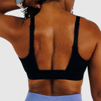 Cross Sports Bra, adjustable straps, reflective logo, breathable recycled polyester blend, ideal for workouts and fitness