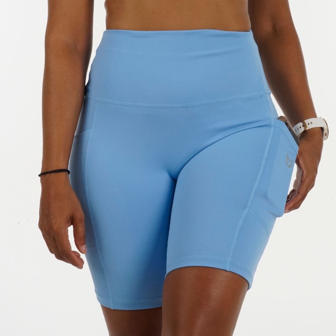 Front profile of Cloud Blue Cycling Shorts highlighting 8.5 cm side pocket and cloud‑blue tone