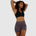Front view of Orchid-Bloom (purple) Performance Shorts with reflective logo.