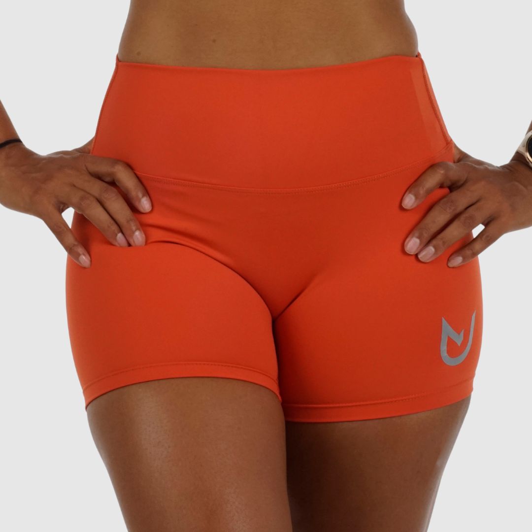 Front view of orange Performance Shorts, maximum freedom of movement