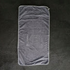Large dark grey microfiber gym towel, 45x90cm, for maximum coverage.