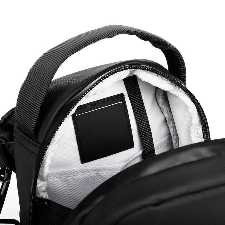 Magnetic Bottle Gymbag, ergonomic sling bag with magnetic attachment, durable fabric, AirTag pocket, ideal for gym and outdoors.