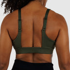 Side profile of Olive Green sports bra, highlighting secure support