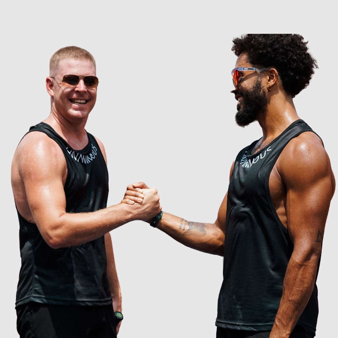 black tank tops shaking hands, showing team spirit.