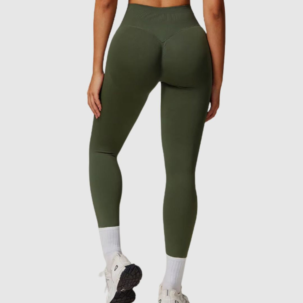 back view of Dark Green Vibe Leggings, featuring high waist and super-stretch fit.